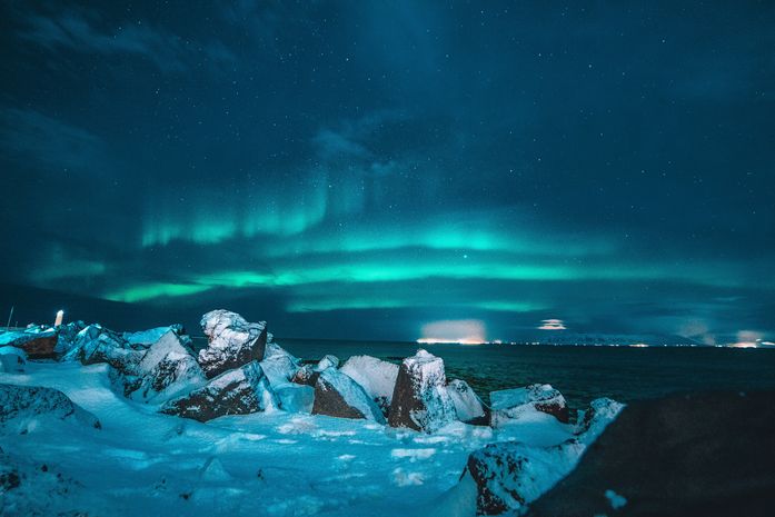 A spectacular view of Northern lights in the evening